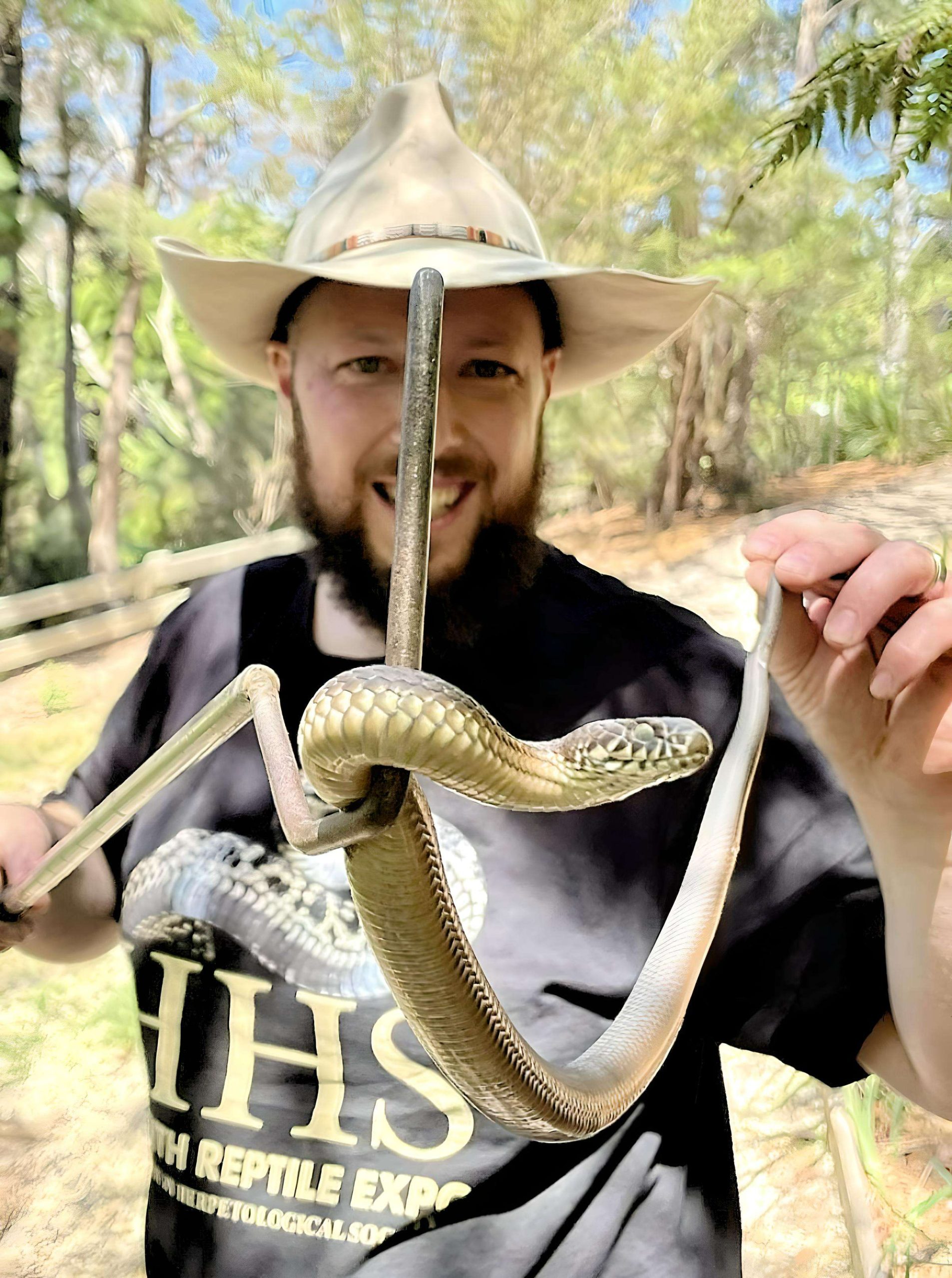 Troy the reptile bloke with a snake